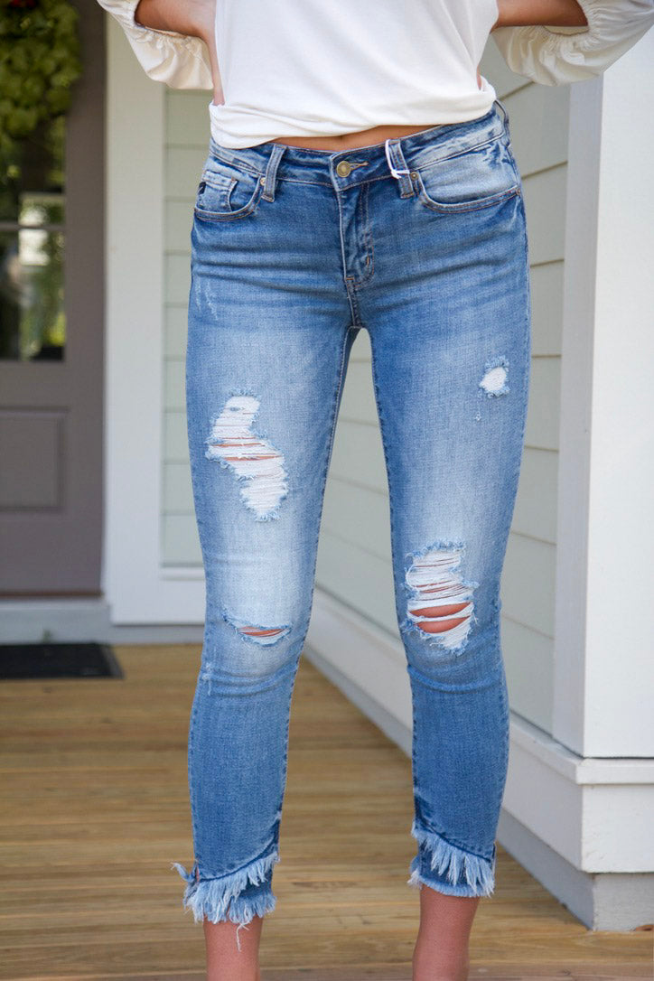 Frayed bottom skinny on sale jeans